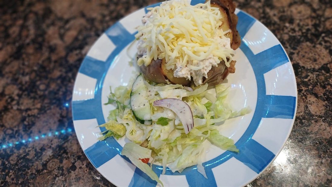 Jacket potato with cheese and salad